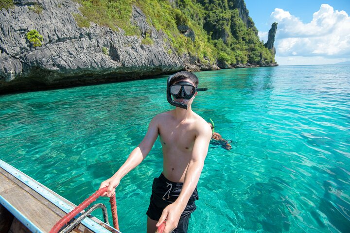 Discover Paradise: Private Long-Tail Boat Tour to Phi Phi Islands from Krabi