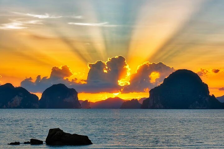 Phi Phi Sunset Cruise: Snorkel, Swim & Secluded Beach Bliss!